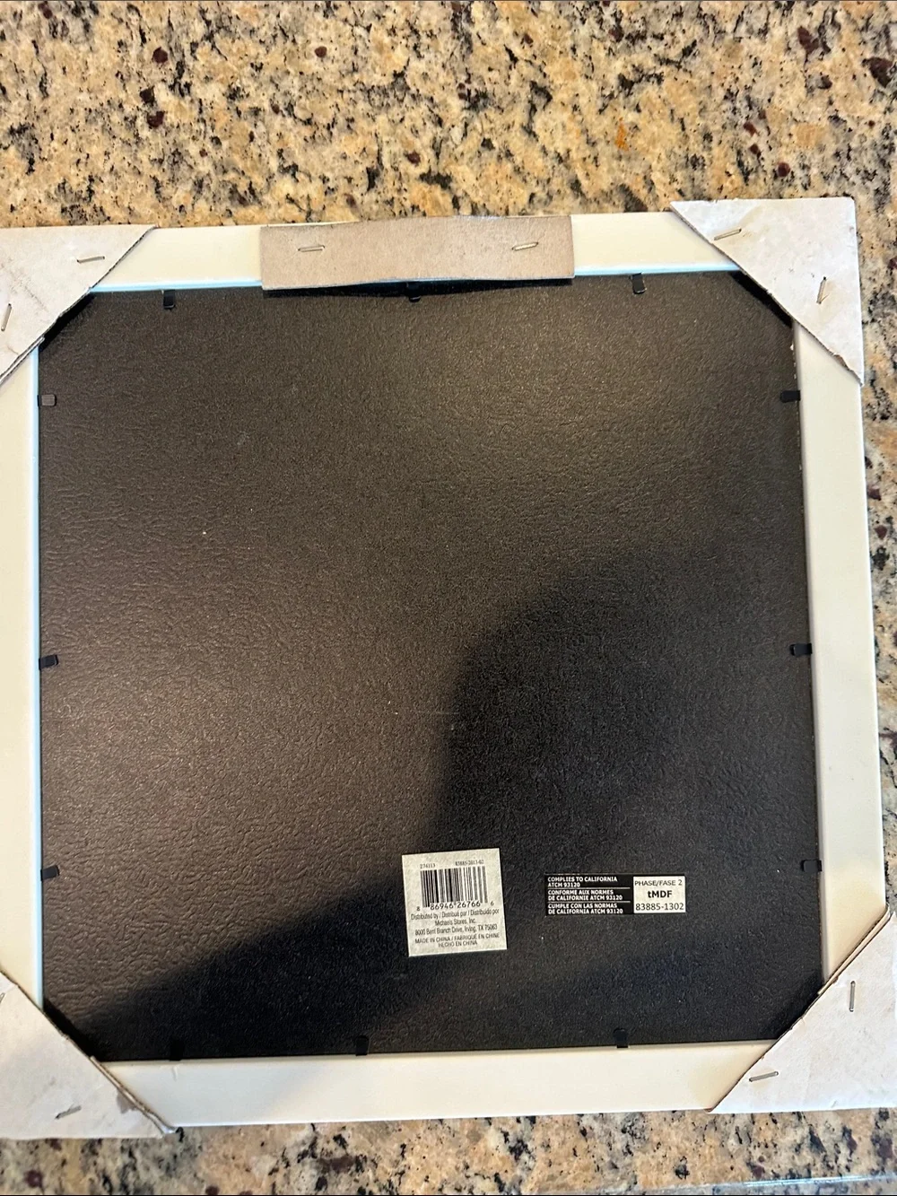 Photo frame with blackboard for messages.